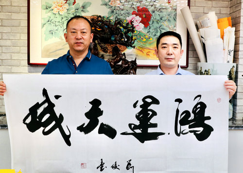 “迎新年 寫春聯(lián) 送祝?！痹诮逃和斫M委會(huì)舉行
